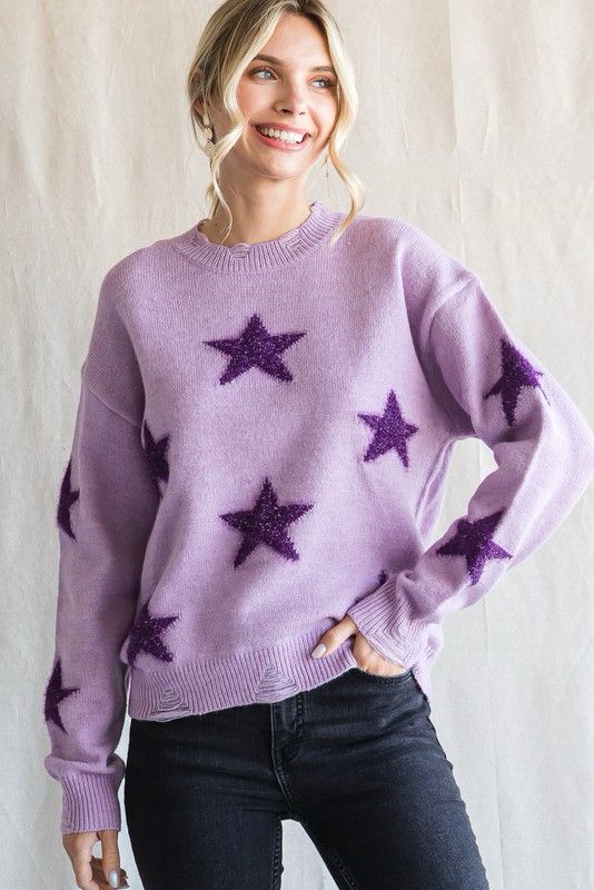 Suéter morado estrellas