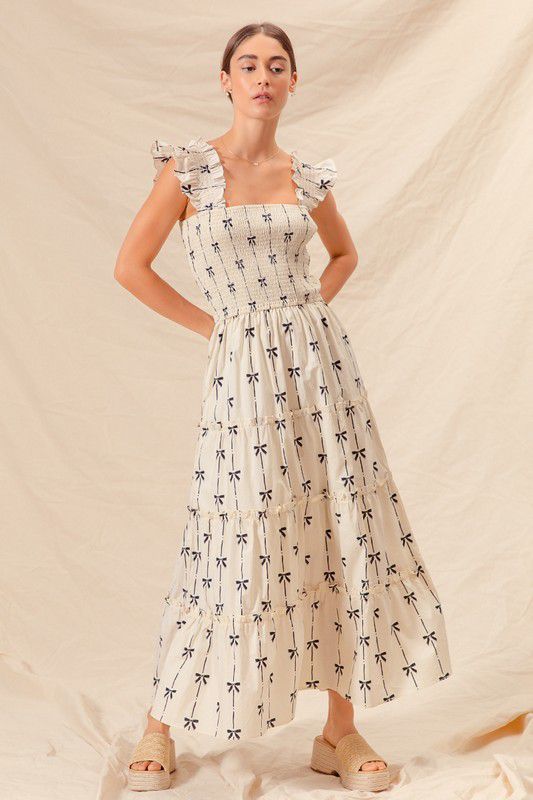 Vestido midi print moños