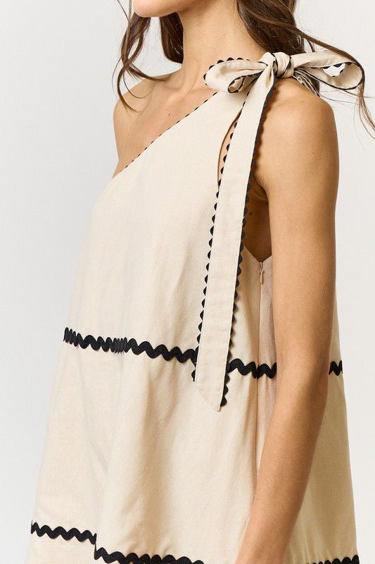 Vestido mini beige con negro