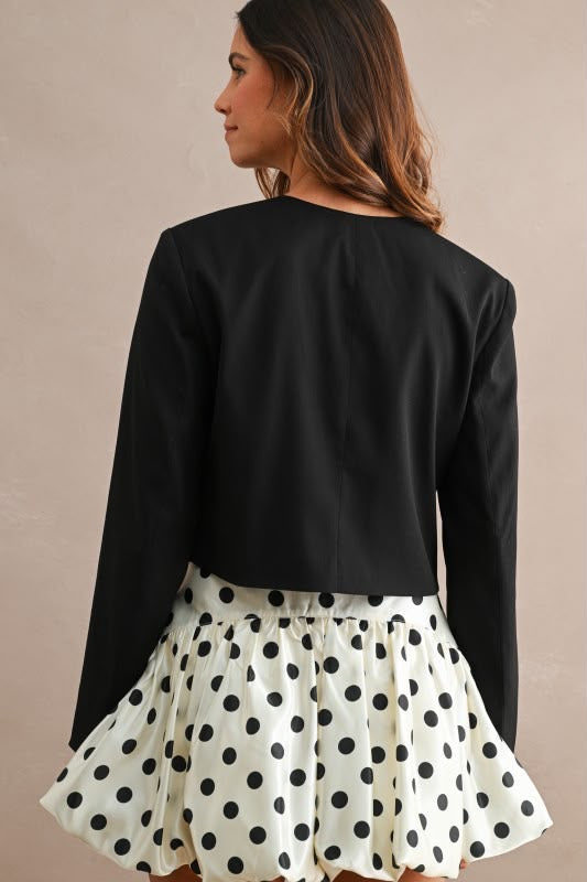 Blazer negro con flor