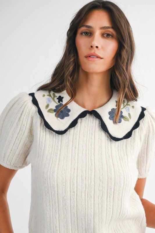 Top beige tejido