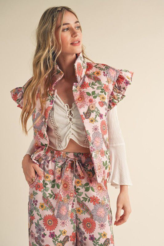 Set pantalón y chaleco flores rosa