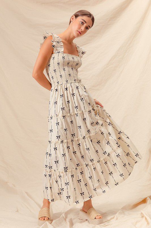 Vestido midi print moños